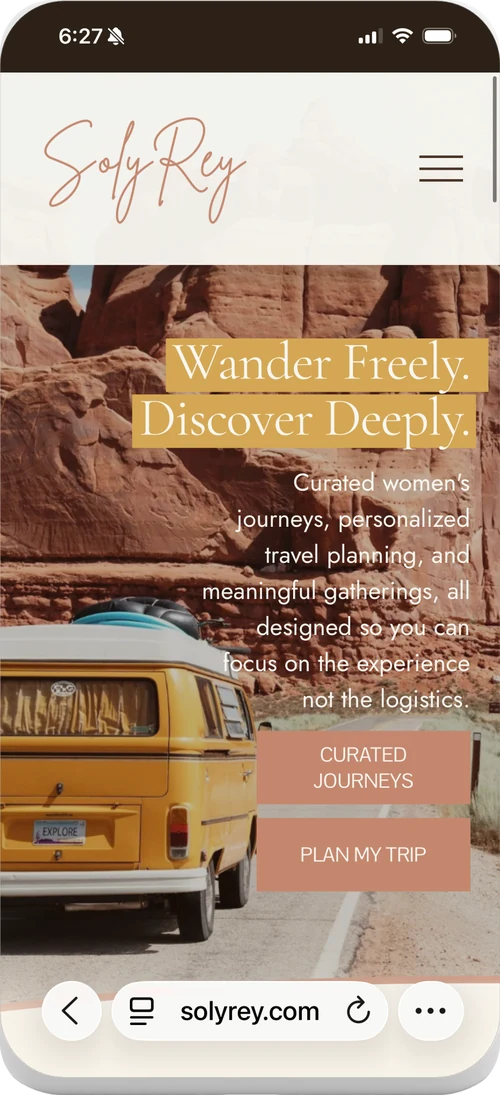 The SolyRey home page on a phone, headed Wander Freely, Discover Deeply, over a yellow camper van against red rock.